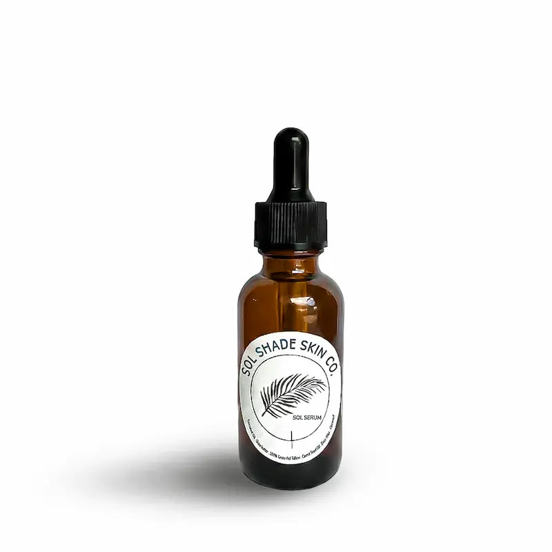 Brown glass bottle with dropper labeled 'Sol Shade Skin Co' on a white background