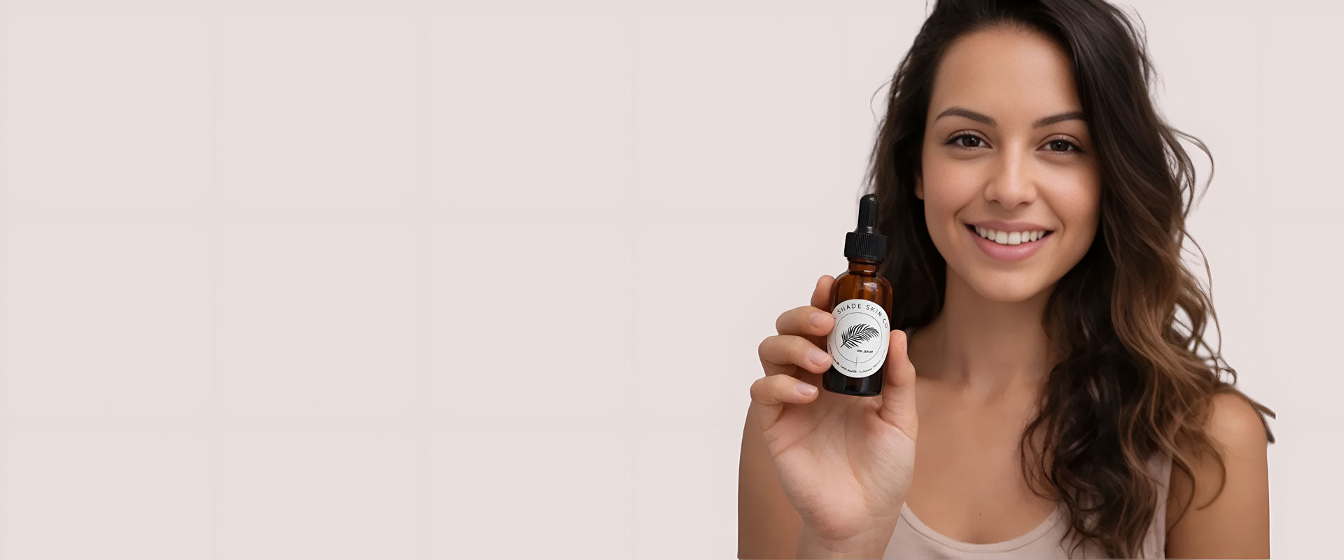 woman with skin care serum in her handslider_item_8aW8WL